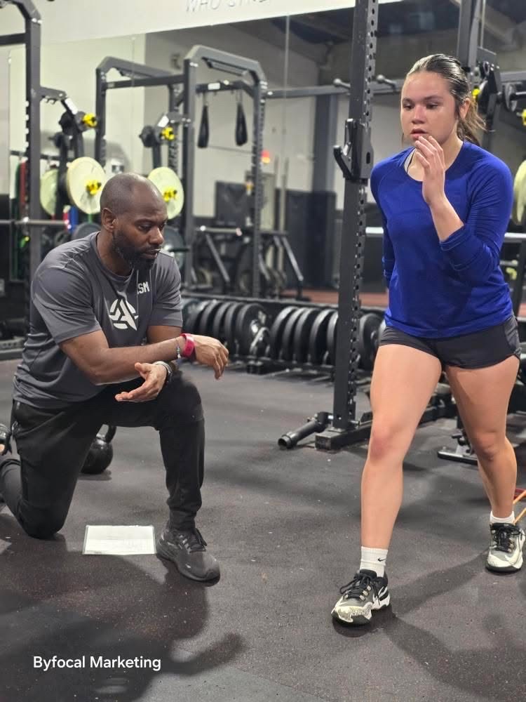 Coach giving an athlete personal feedback during training